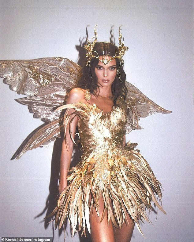 Kendall Jenner Halloween New Kendall Jenner Glitters In Gold while Posing as A forest Fairy On top