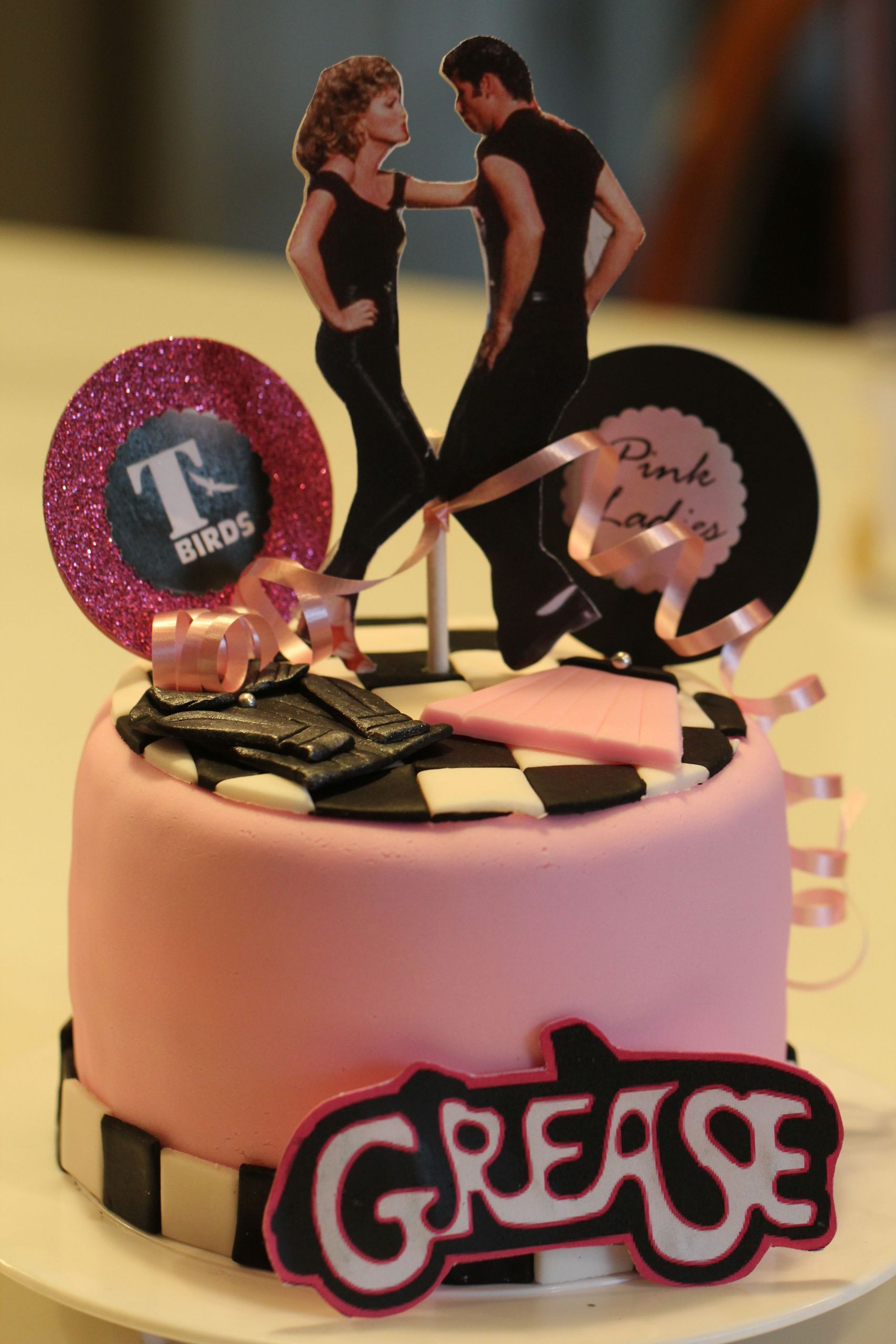 Grease theme Party Unique Tell Me ‘bout It Stud Grease Pink Lady and T Bird Cupcakes